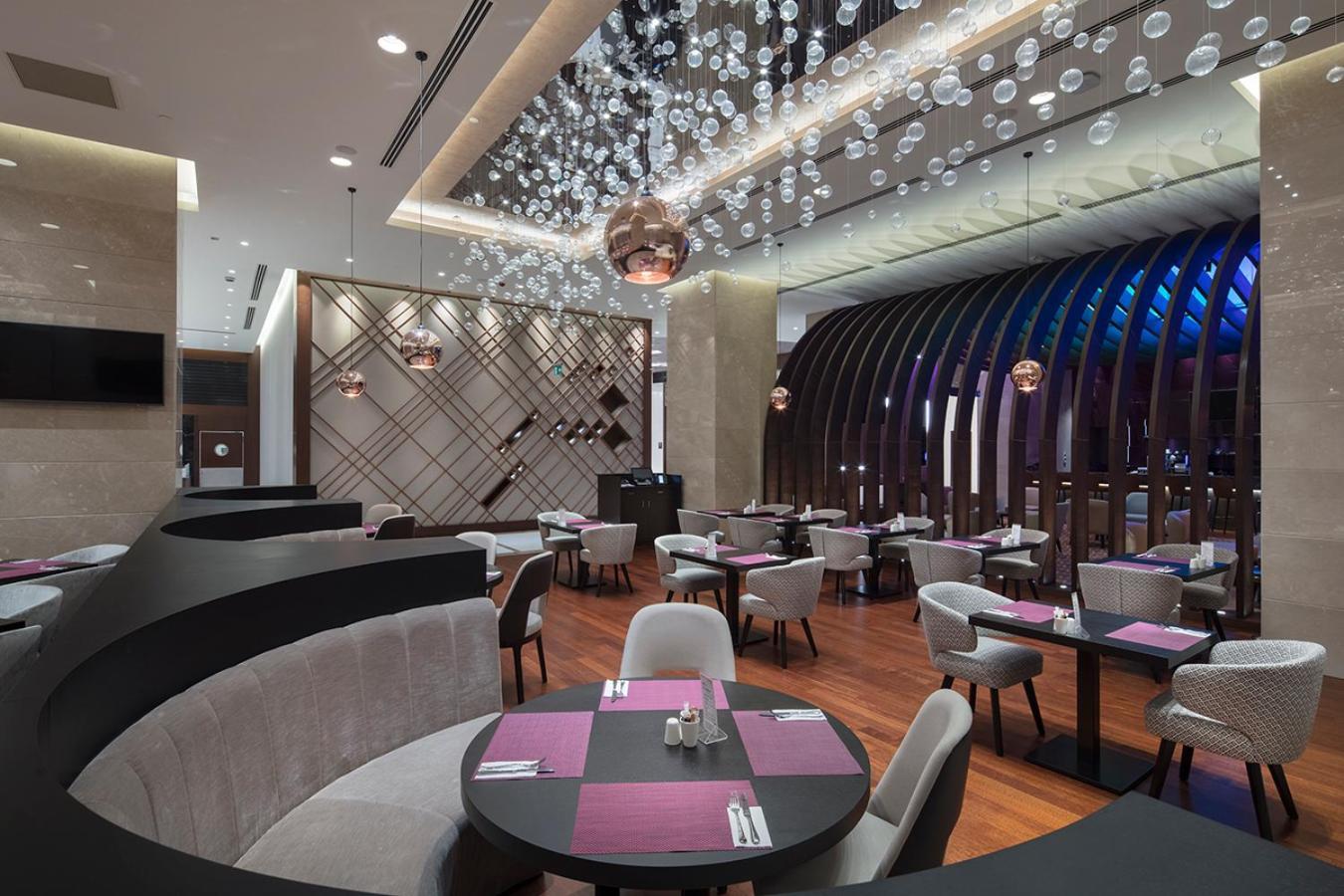 Hotel Doubletree By Hilton Istanbul Umraniye Exterior foto The interior of the restaurant