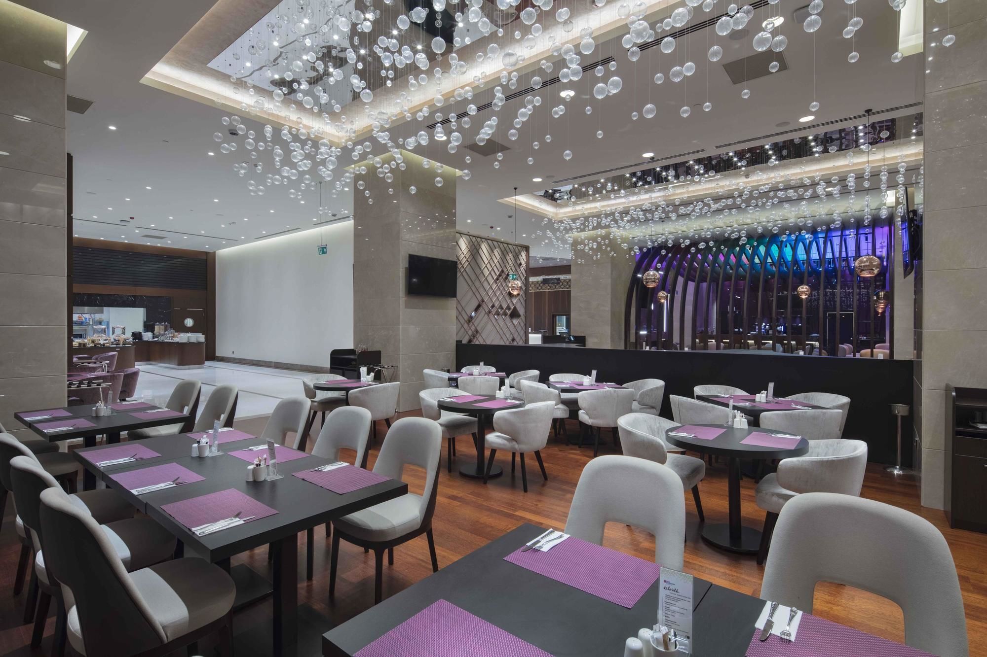 Hotel Doubletree By Hilton Istanbul Umraniye Exterior foto The interior of the restaurant